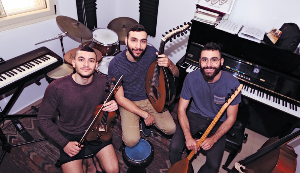 The Sakhnini brothers at home in their music room. Picture courtesy of maozisrael.org.