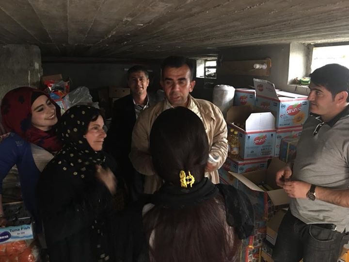 A young Peshmerga widow asking about the Jesus at a food distribution. 