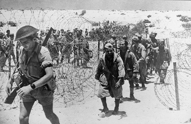 Italian prisoners of war, taken at El Alamein. See Photo Credits.