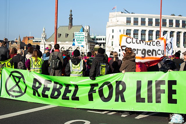 Extinction Rebellion, which plays a lot on the language of rebellion as part of its campaign. See Photo Credits.