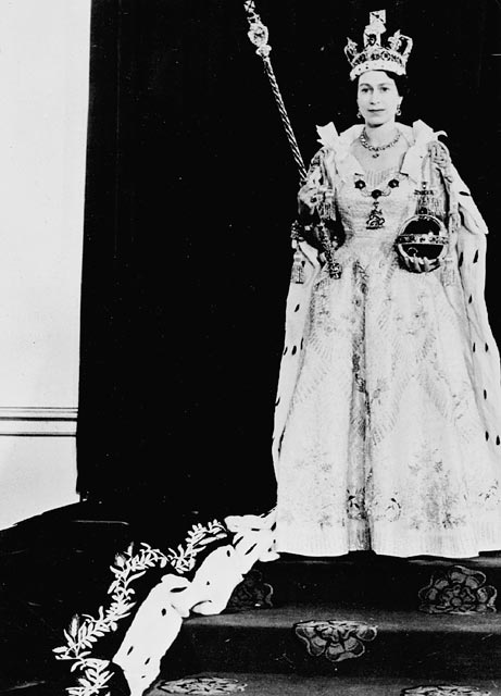 H.M. Queen Elizabeth II wearing her Coronation robes and regalia.