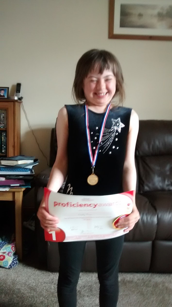 Emily was very proud of achieving her gymnastics awards