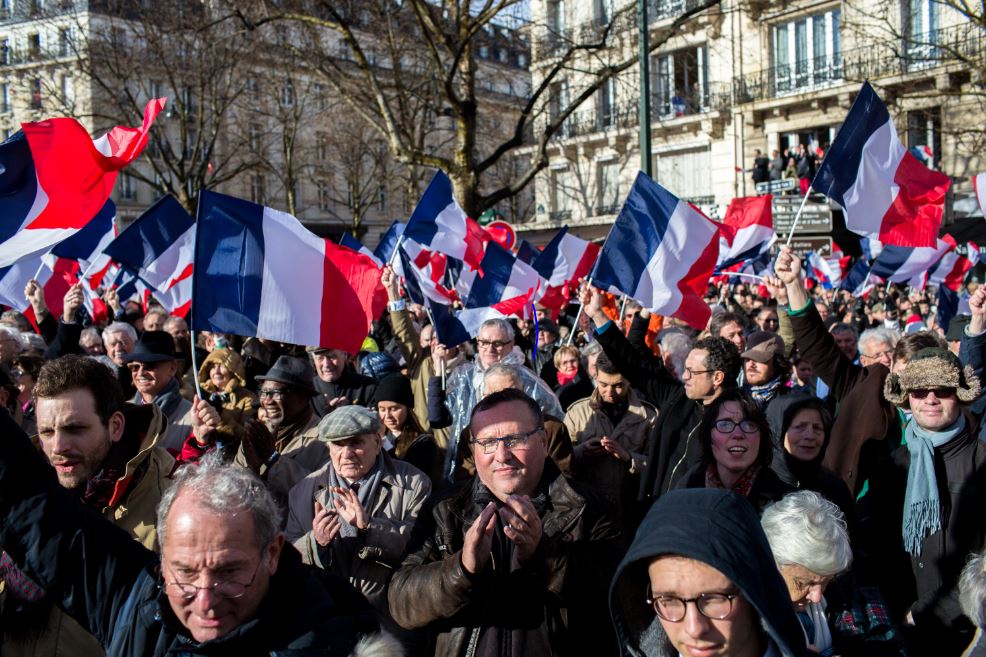 French voters demonstrate their patriotism. See Photo Credits.