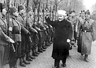 Hajj Amin salutes a Muslim-volunteer Waffen-SS unit, 1943 - see note 12 