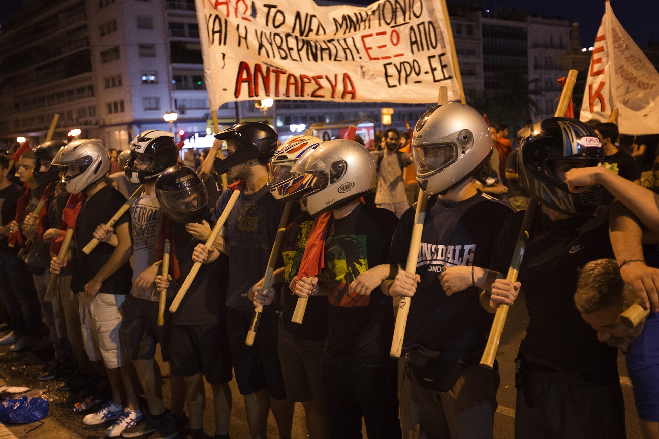 Protestors clashed with police outside the Greek Parliament on Wednesday.