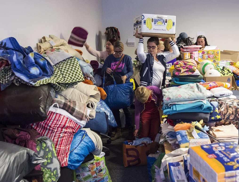 People organize aid in Erfurt, Germany. Jens Meyer/AP/PA Images