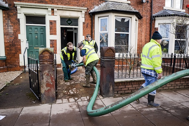 The clear up begins in Carlisle. See Photo Credits.