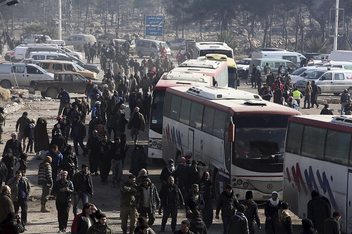 Refugees from Aleppo arrive at a camp near Idlib, Syria. AP/Press Association Images.