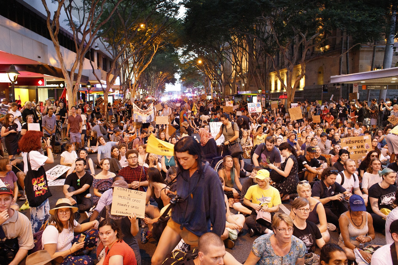 Spurred by the recent fires in south-east Australia, university students block roads in Brisbane protesting about climate change.