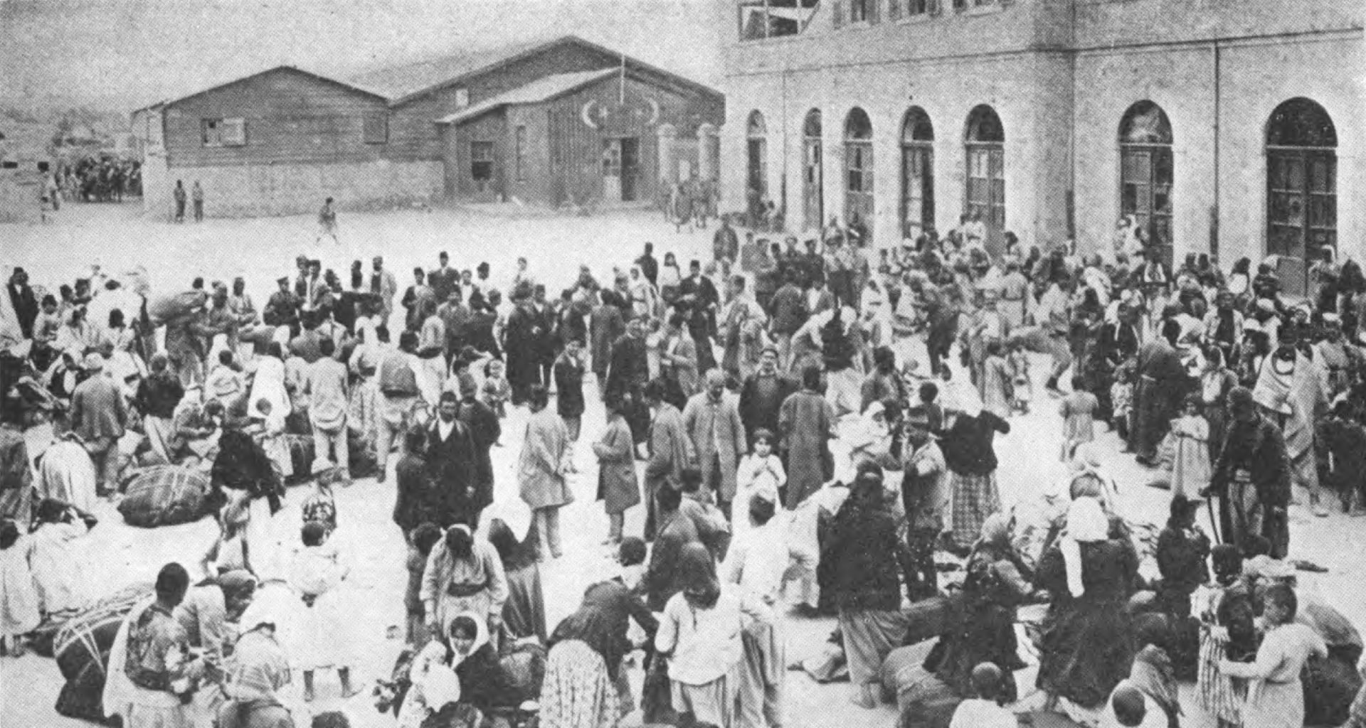 Armenians gather in a city prior to deportation. They were murdered outside the city.