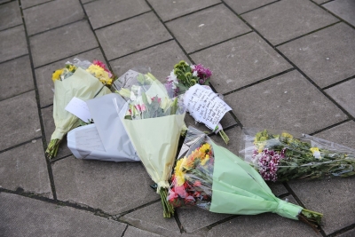 Tributes in West Kensington, where a teenager was fatally stabbed on Thursday.