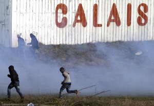 Tear gas used on migrants in Calais.