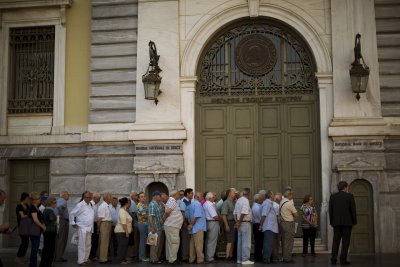 Queues today outside the National Bank in Greece.