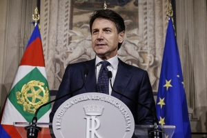 Giuseppe Conte addresses the media.
